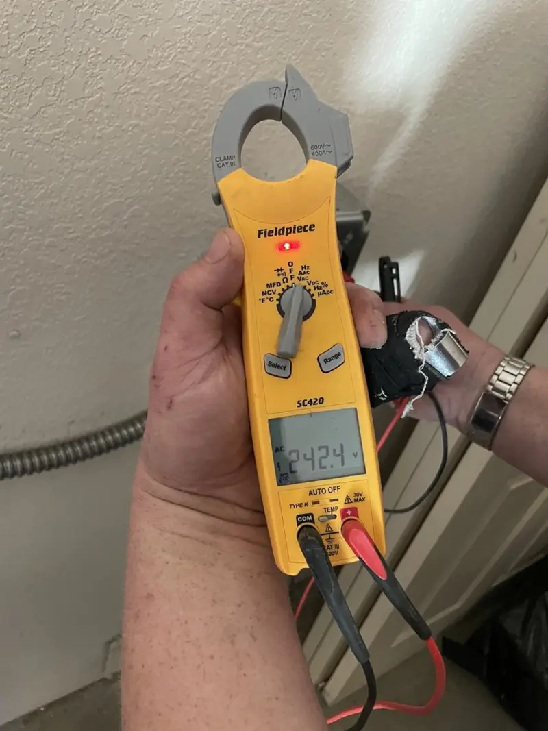 Voltage testing with clamp meter during Recessed Lighting Installation in Lake Nacimiento